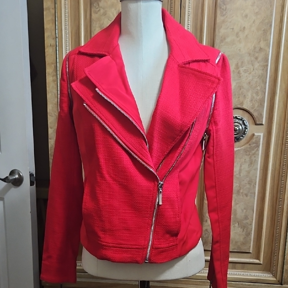 1. State Women's Vibrant Red Utility Jacket With Zippers And Removable Sleeves.